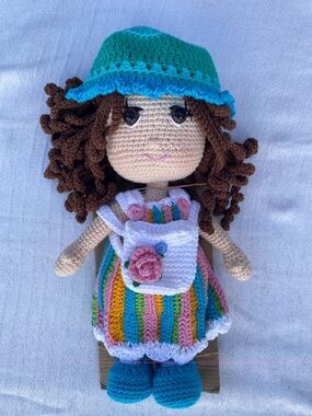 Handmade Crochet Doll with Colorful Striped Dress and Teal Hat